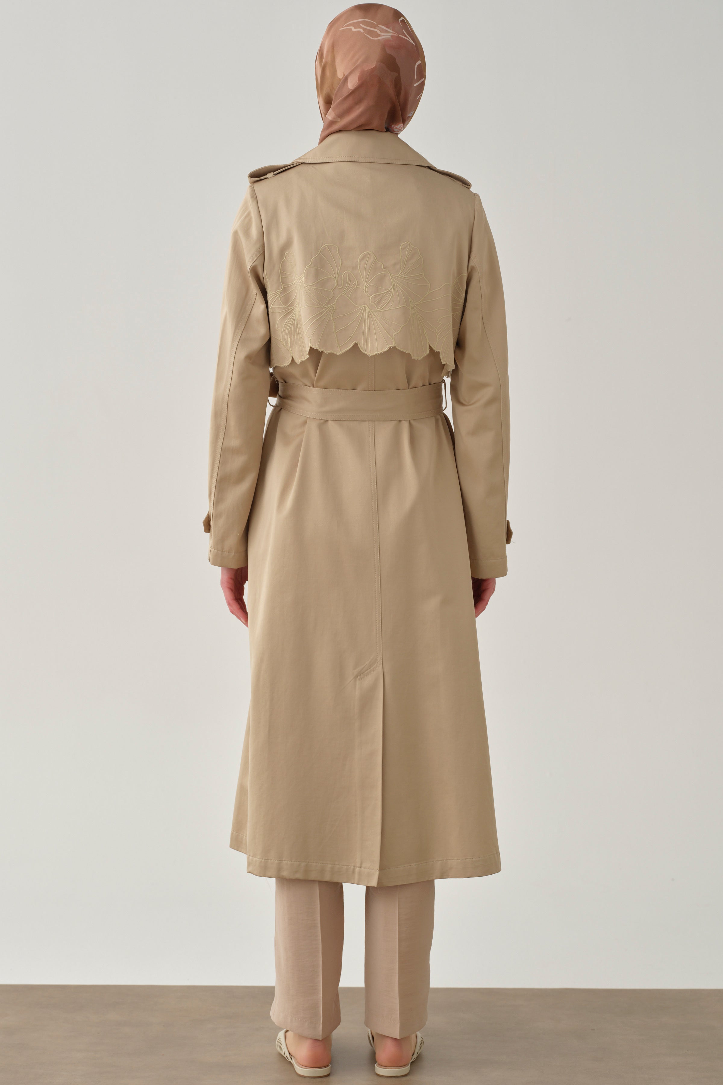 Trench coat with embroidered details and windproof flap - Tuğba