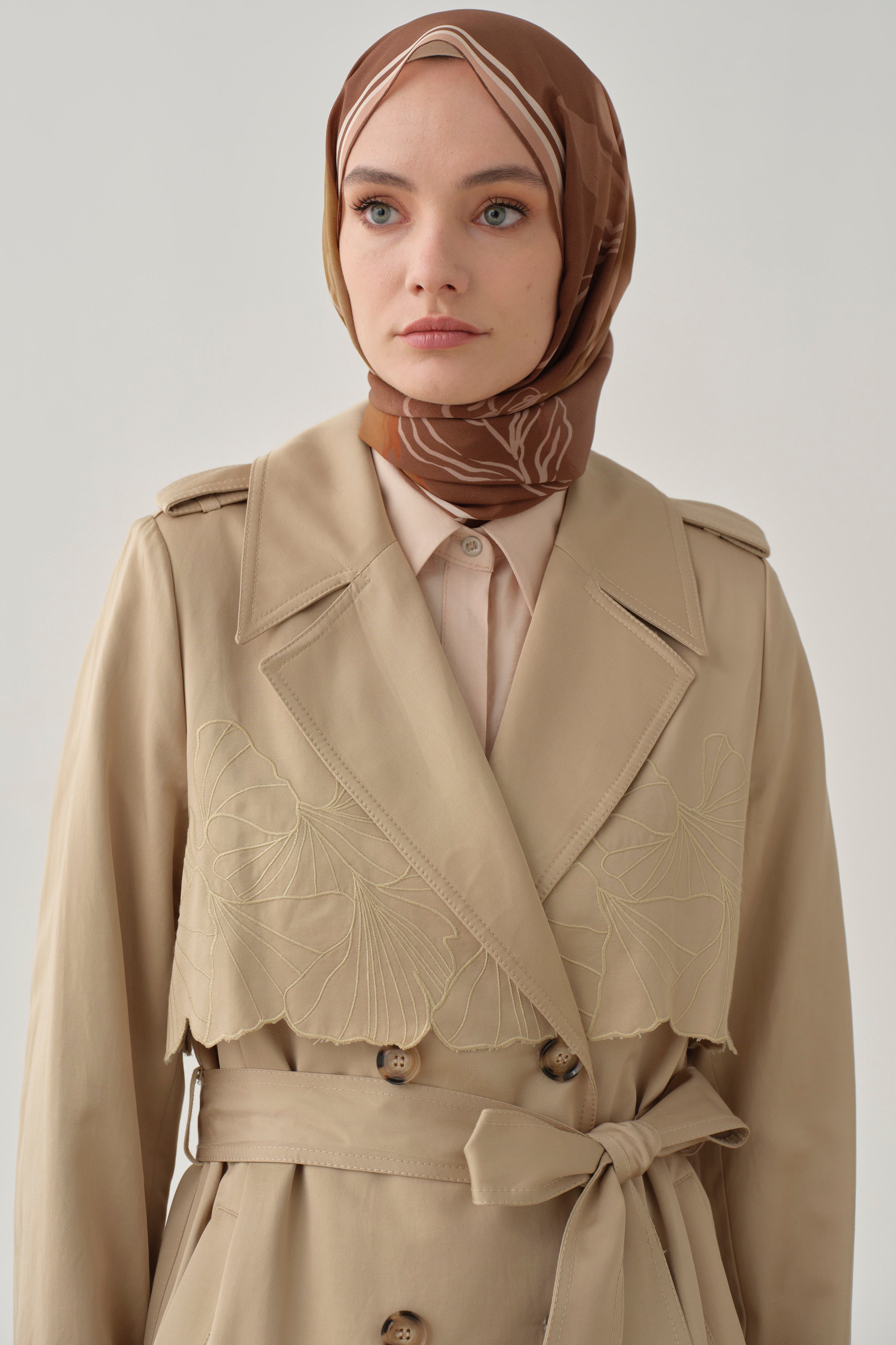 Trench coat with embroidered details and windproof flap - Tuğba